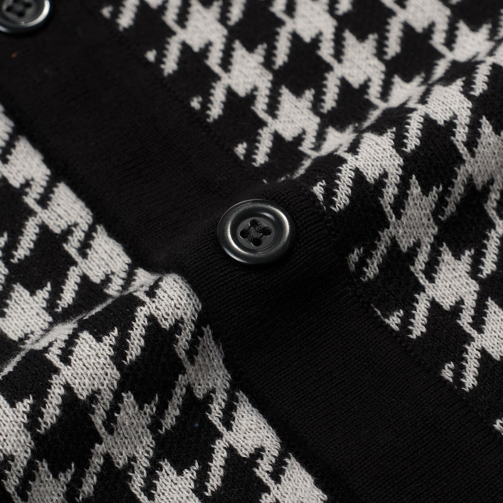 Men's black knitted polo cardigan with houndstooth pattern and red heart patch