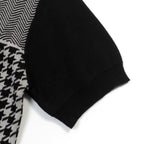 Men's black knitted polo cardigan with houndstooth pattern and red heart patch