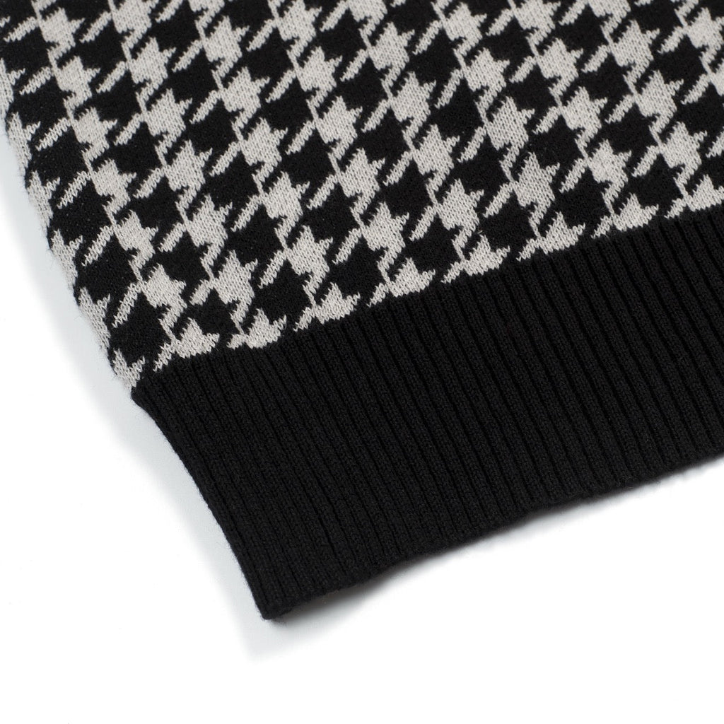 Men's black knitted polo cardigan with houndstooth pattern and red heart patch