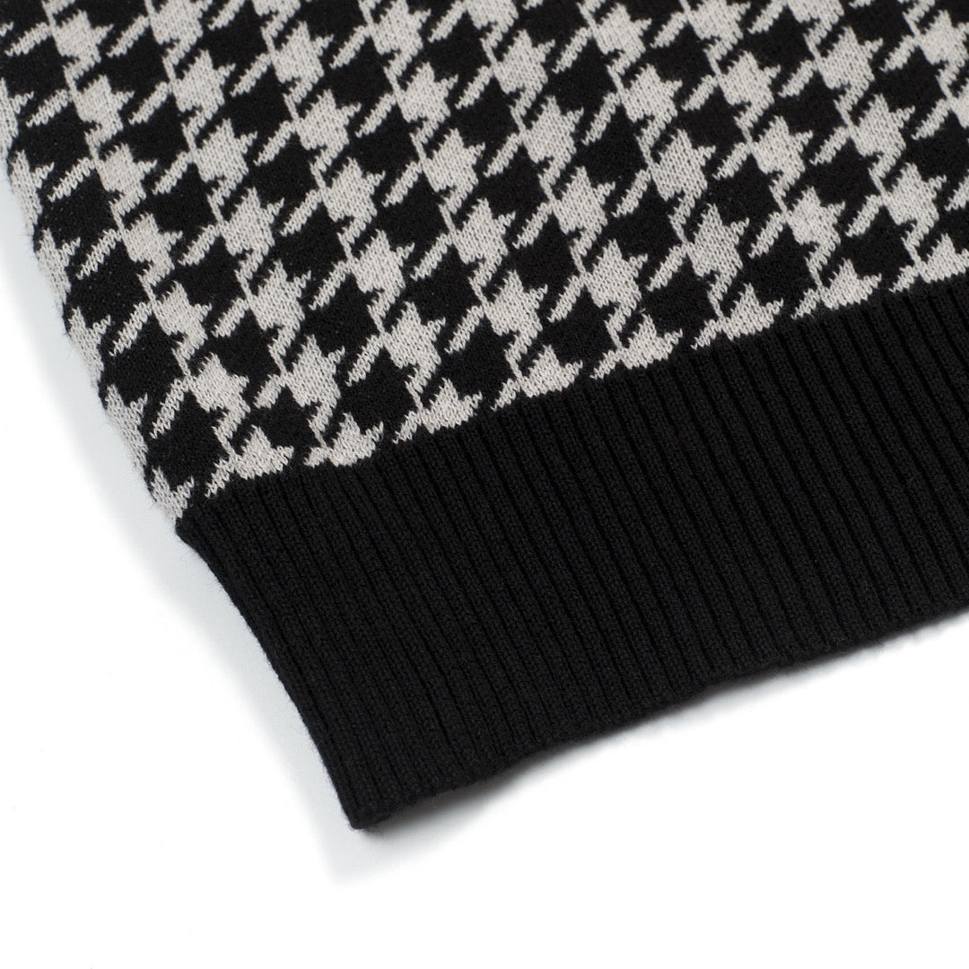 Men's black knitted polo cardigan with houndstooth pattern and red heart patch