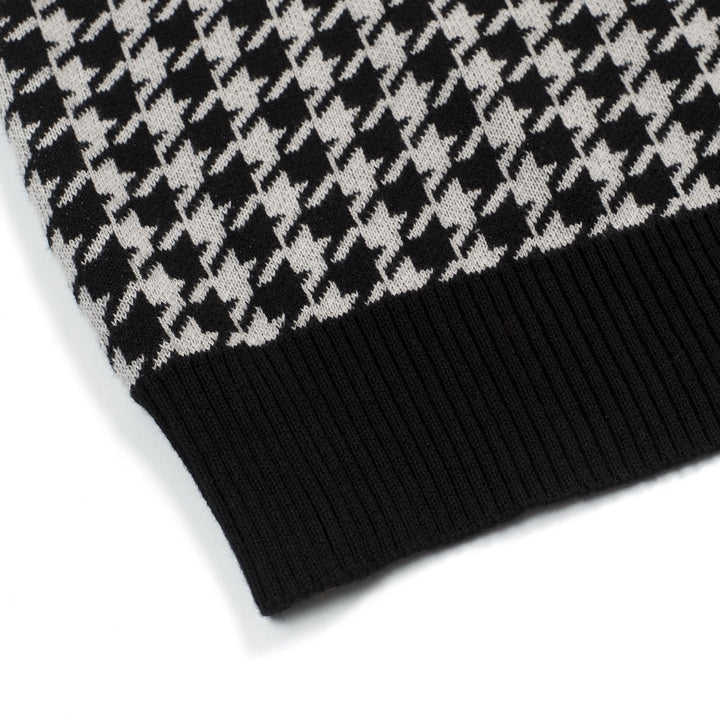 Men's black knitted polo cardigan with houndstooth pattern and red heart patch
