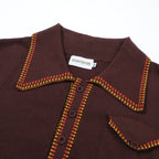 Men's dark brown knit polo shirt with yellow and red geometric trim