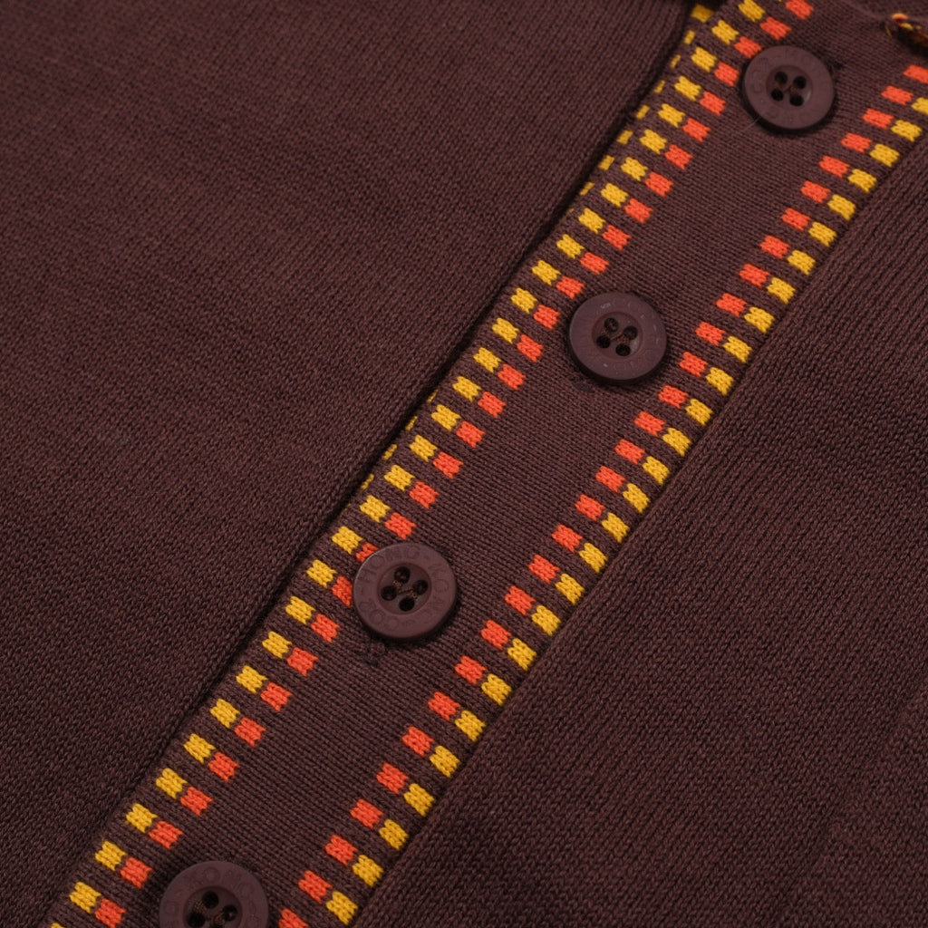 Men's dark brown knit polo shirt with yellow and red geometric trim