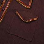 Men's dark brown knit polo shirt with yellow and red geometric trim