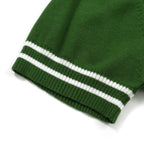 Men's green cable knit polo shirt with striped collar and short sleeves