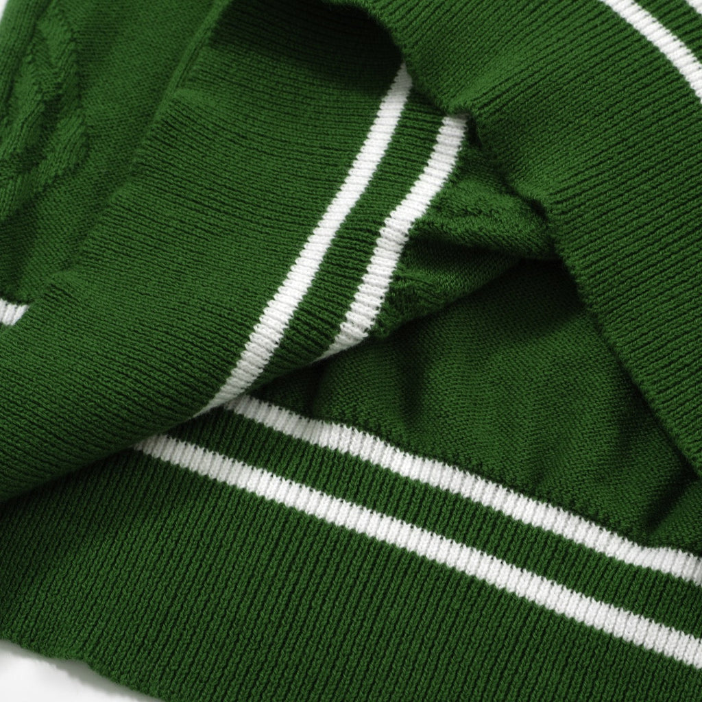 Men's green cable knit polo shirt with striped collar and short sleeves