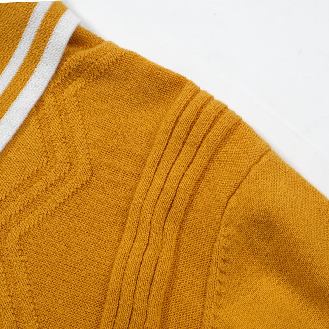 Yellow textured knit polo shirt with striped collar and short sleeves
