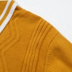 Yellow textured knit polo shirt with striped collar and short sleeves