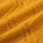 Yellow textured knit polo shirt with striped collar and short sleeves