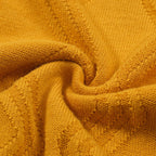 Yellow textured knit polo shirt with striped collar and short sleeves