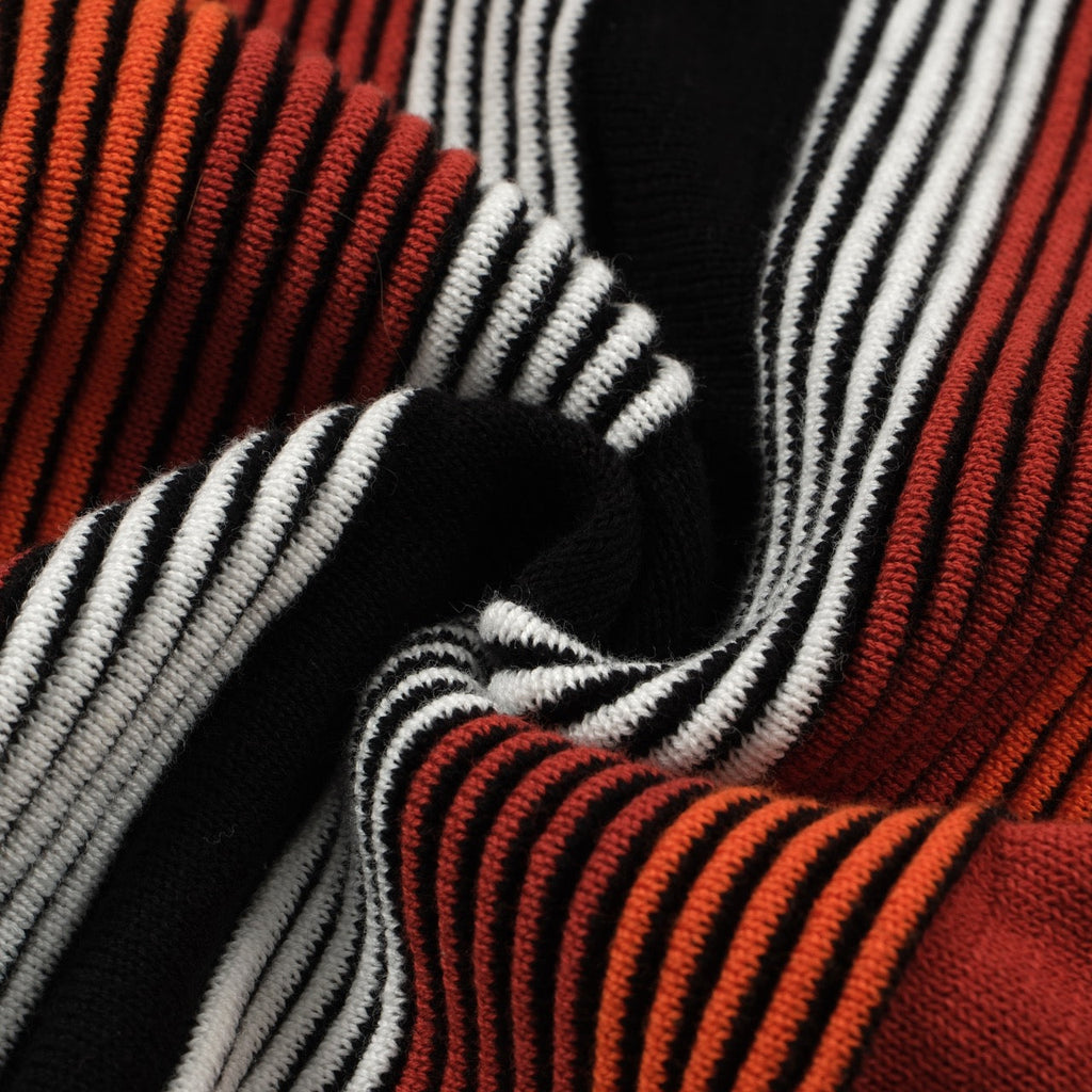 Men's black knit polo with red, orange and white vertical stripes