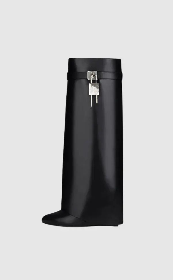 Women's knee-high platform boots with decorative buckle detail