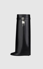 Women's knee-high platform boots with decorative buckle detail