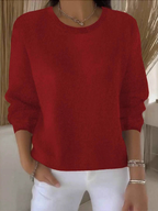 Women's crew neck knitted sweater with long sleeves and ribbed trims