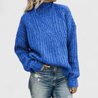 Women's cable knit sweater with mock neck and long sleeves