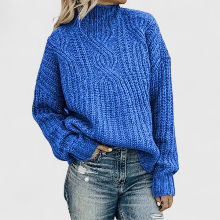 Women's cable knit sweater with mock neck and long sleeves