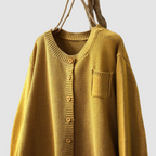 Women's textured knit button cardigan with round neckline, long sleeves and chest pocket