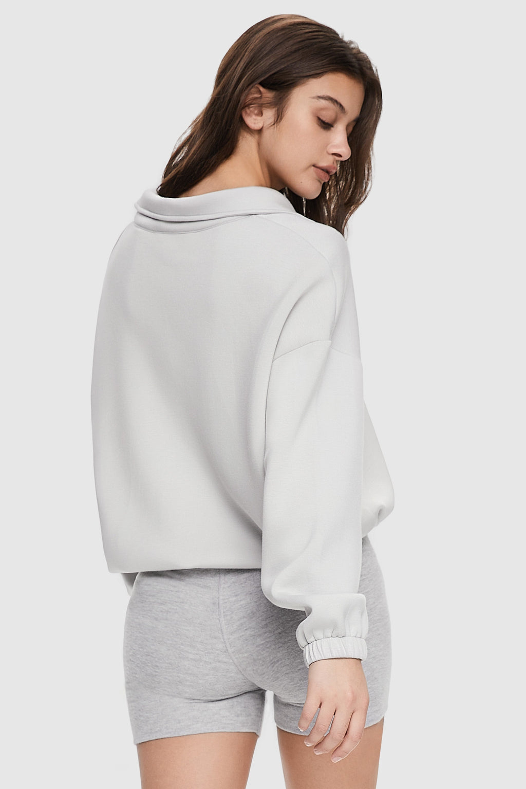 Women's cropped full zip sweatshirt with raised collar and drawstring hem