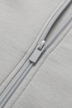 Women's cropped full zip sweatshirt with raised collar and drawstring hem