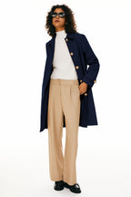 Women's single-breasted trench coat with pointed collar and button front