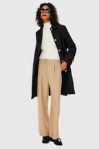 Women's single-breasted trench coat with pointed collar and button front