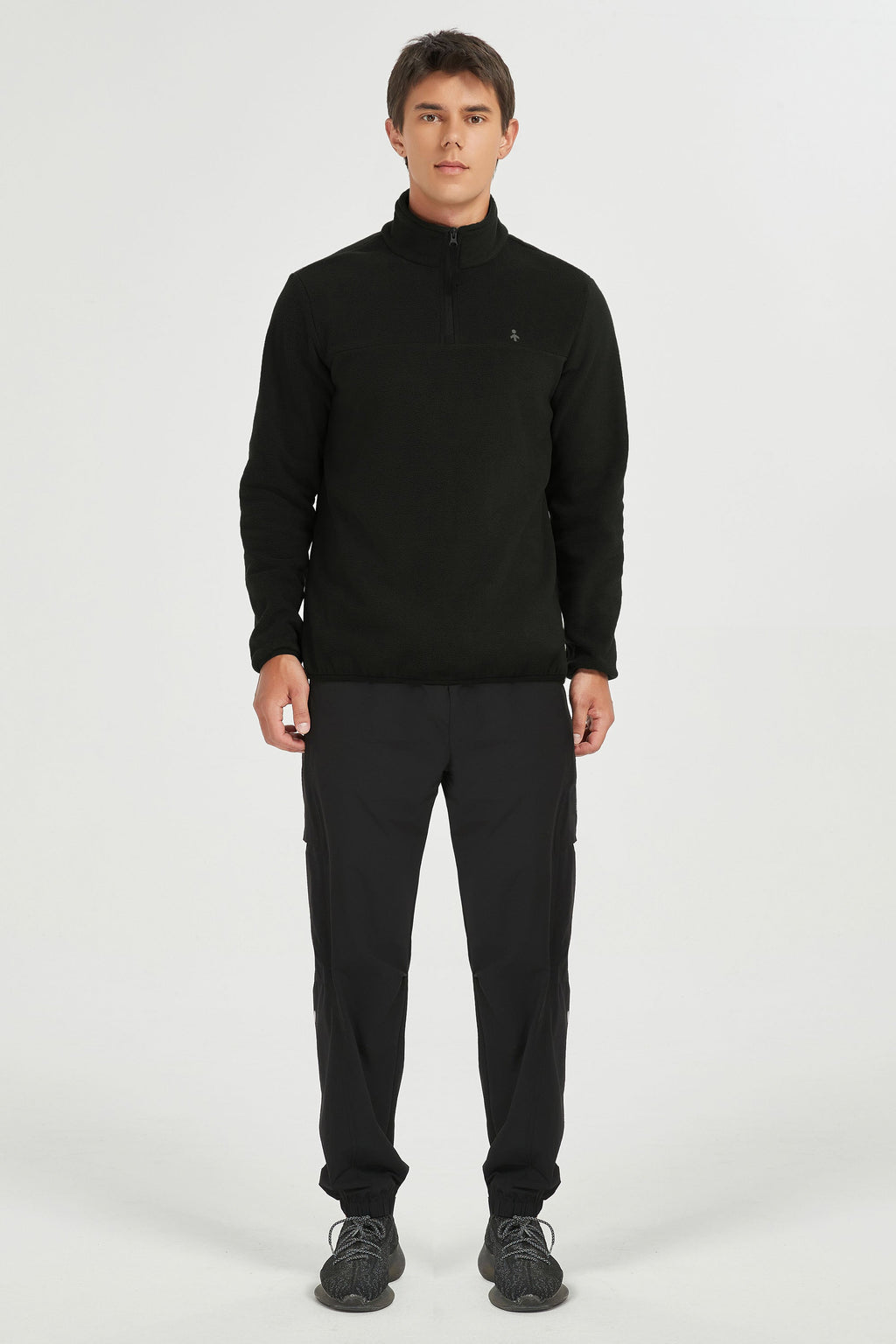 Men's quarter-zip fleece pullover with raised collar and long sleeves