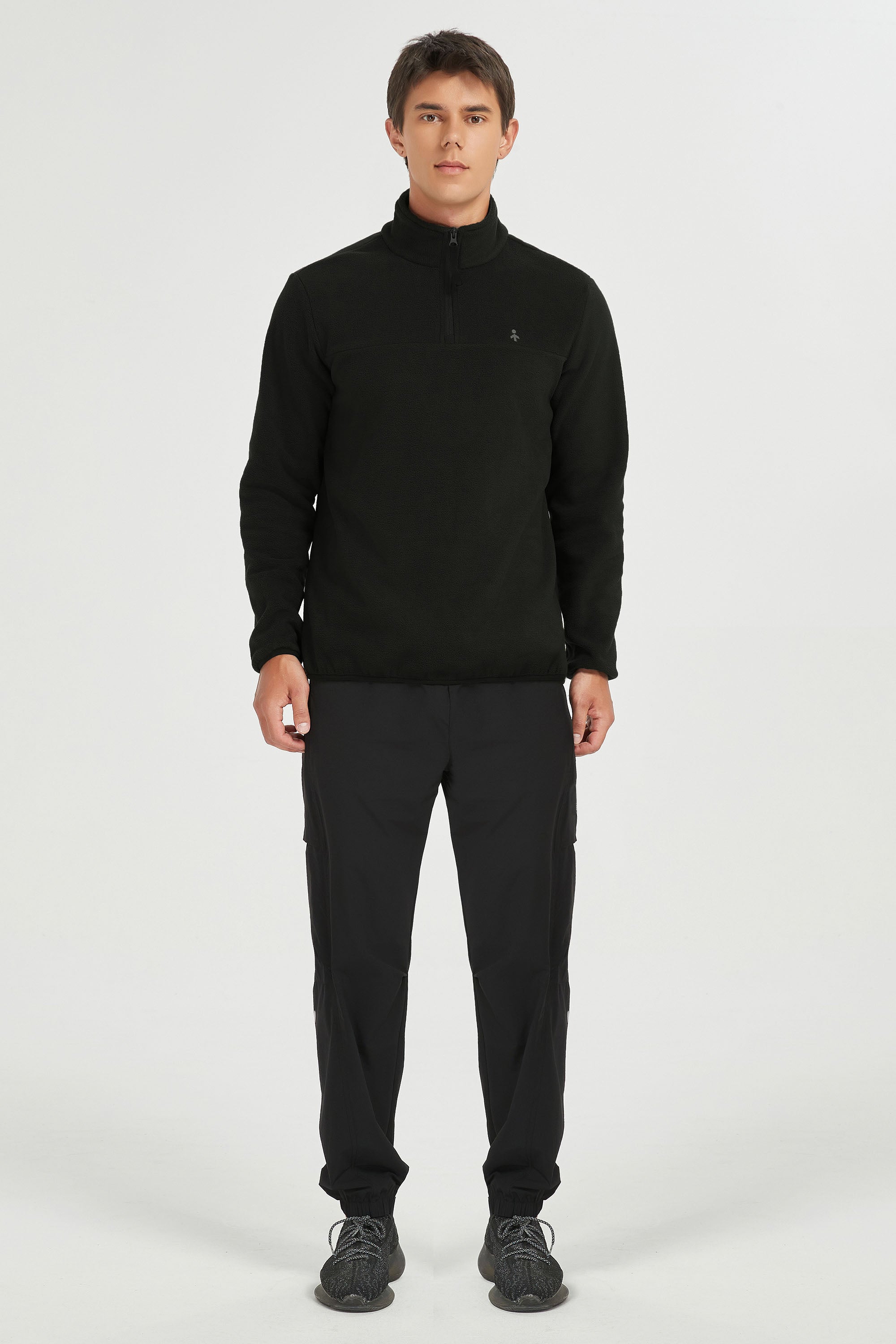 Men's quarter-zip fleece pullover with raised collar and long sleeves