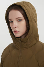 Women's hooded quilted puffer jacket with half-zip front and front pockets