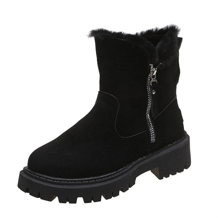 Women's ankle boots with faux fur trim, side zips and chunky lug soles