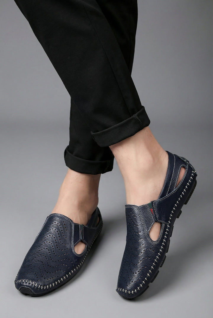 Men's perforated slip-on loafers with round toes, flat soles and contrast stitching