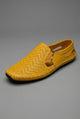 Men's perforated slip-on loafers with round toes, flat soles and contrast stitching
