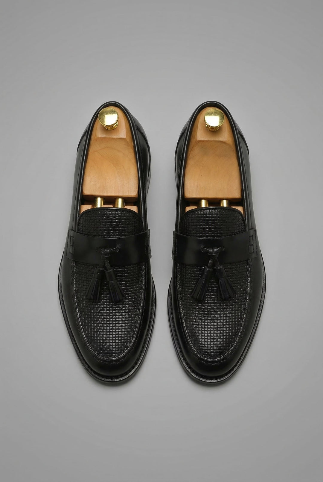 Men's woven tassel loafers with textured vamp and low heel