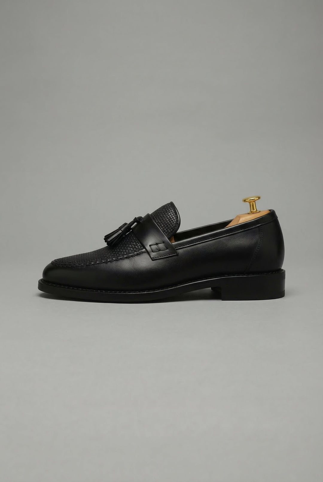 Men's woven tassel loafers with textured vamp and low heel