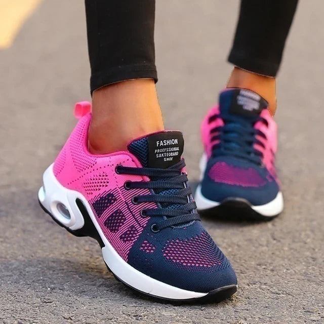 Low-top lace-up sneakers with perforated upper and segmented sole