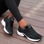 Low-top lace-up sneakers with perforated upper and segmented sole