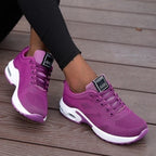 Low-top lace-up sneakers with perforated upper and segmented sole