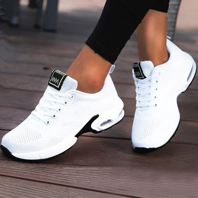 Low-top lace-up sneakers with perforated upper and segmented sole