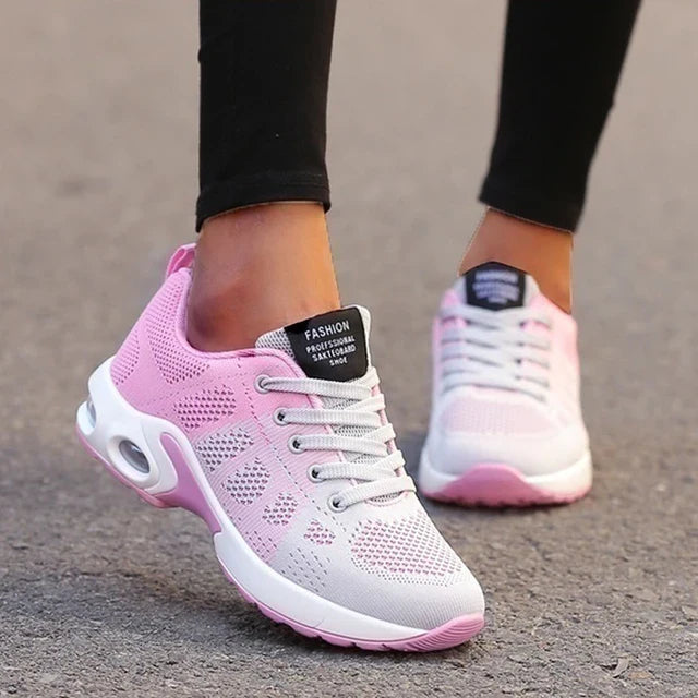 Low-top lace-up sneakers with perforated upper and segmented sole