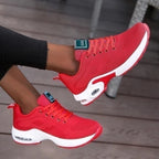 Low-top lace-up sneakers with perforated upper and segmented sole