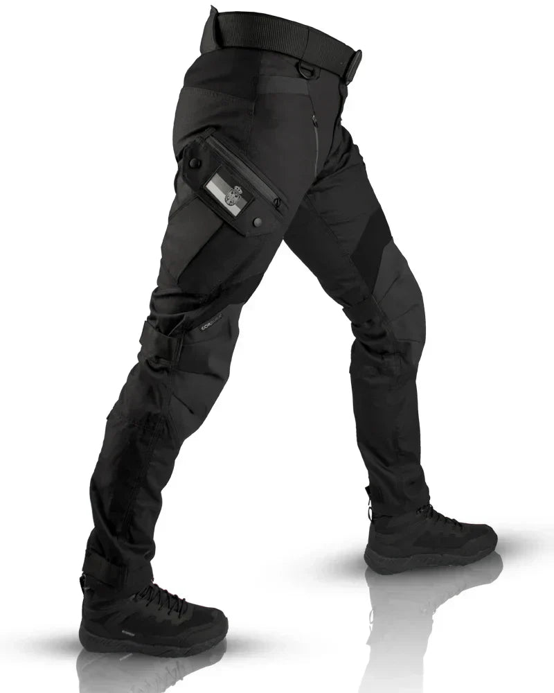 Men's tapered cargo trousers with utility pockets, belt and ankle details