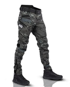Men's tapered cargo trousers with utility pockets, belt and ankle details