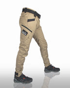 Men's tapered cargo trousers with utility pockets, belt and ankle details