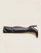 Women's black knee-high boots with pointed toes and block heels