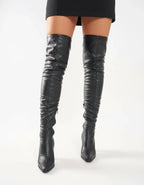 Women's black knee-high boots with pointed toes and block heels