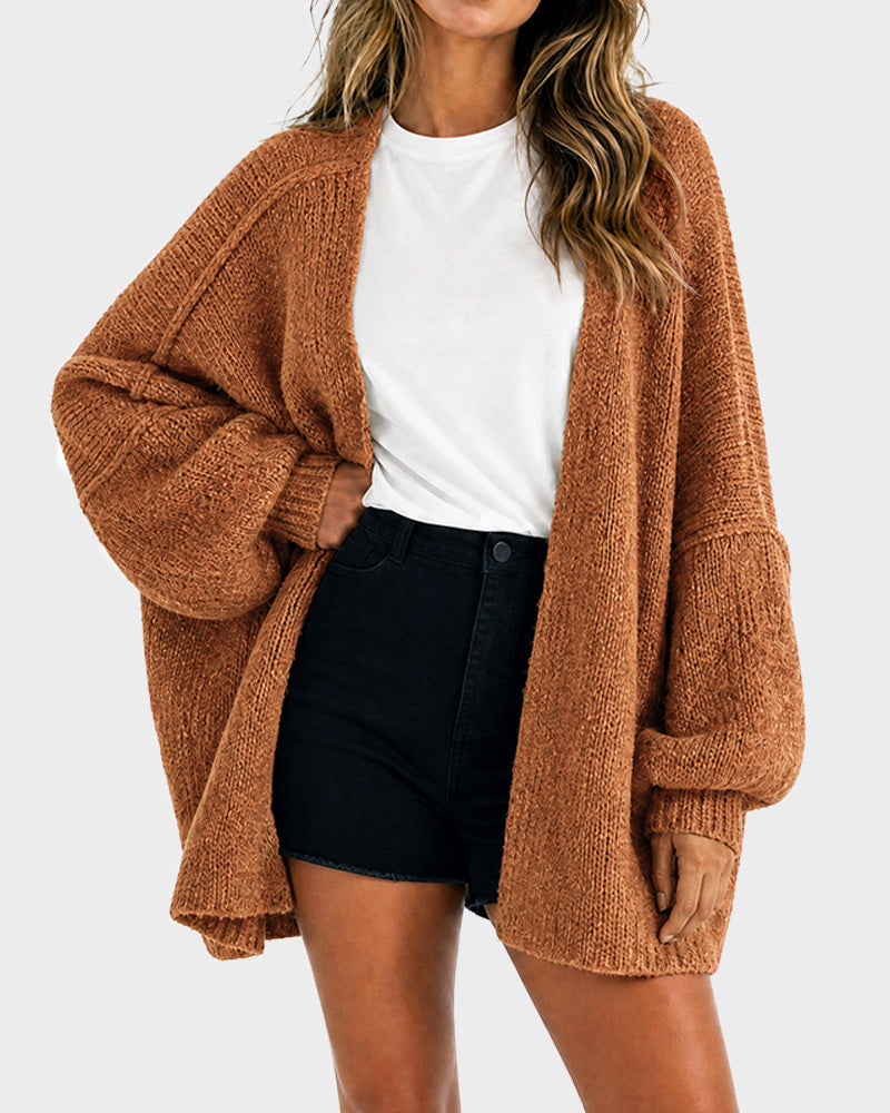 Women's oversized textured knit cardigan with open front and lantern sleeves