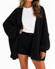 Women's oversized textured knit cardigan with open front and lantern sleeves