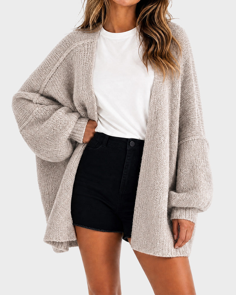 Women's oversized textured knit cardigan with open front and lantern sleeves