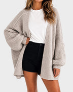 Women's oversized textured knit cardigan with open front and lantern sleeves
