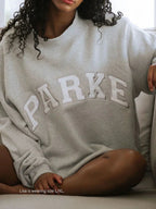 Women's oversized sweatshirt with large chenille-style letter graphic