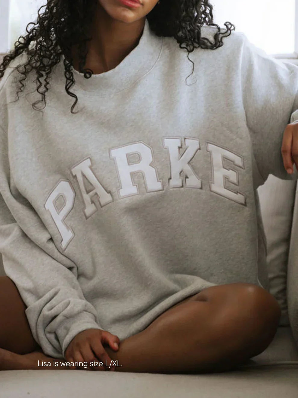 Women's oversized sweatshirt with large chenille-style letter graphic